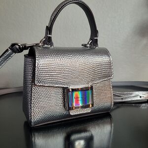 Kate Spade New York Katy  Embossed Metallic Micro Crossbody bag.
